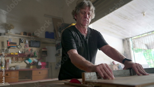 Master carpenter working in his woodwork or workshop