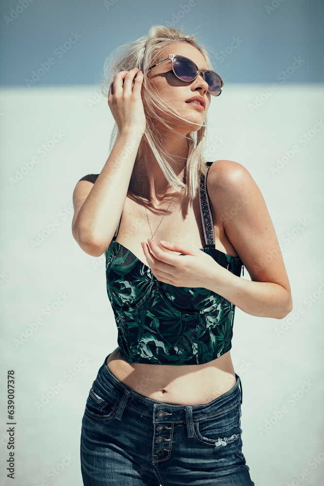 Fototapeta premium Beautiful Blonde Women In Sunglasses at the Utah Salt Flats