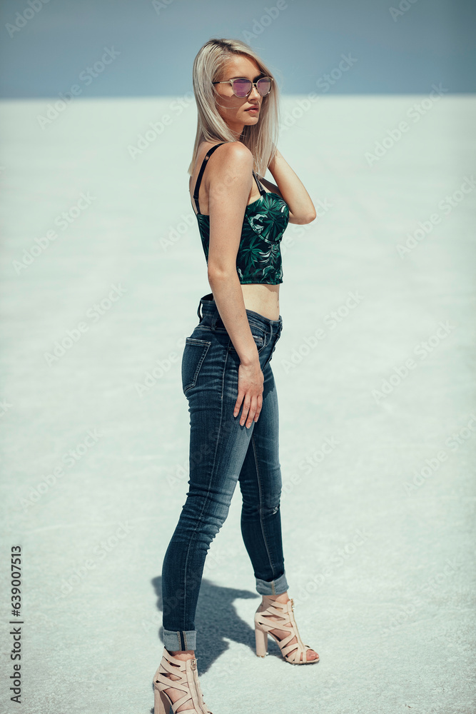 Beautiful Blonde Women In Sunglasses at the Utah Salt Flats Beautiful Blonde Women In Sunglasses at the Utah Salt Flats