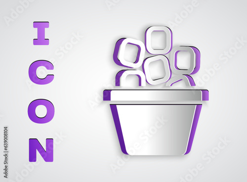 Paper cut Ice bucket filled with ice cubes icon isolated on grey background. Paper art style. Vector