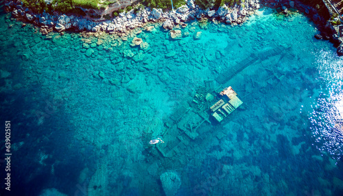 Top down aerial view of sunken ship Boka, lying on the sea bottom at the town of Orebic, Croatia, located on the Peljesac peninsula. © Miroslav Posavec