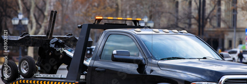 Canvas Print tow truck in street
