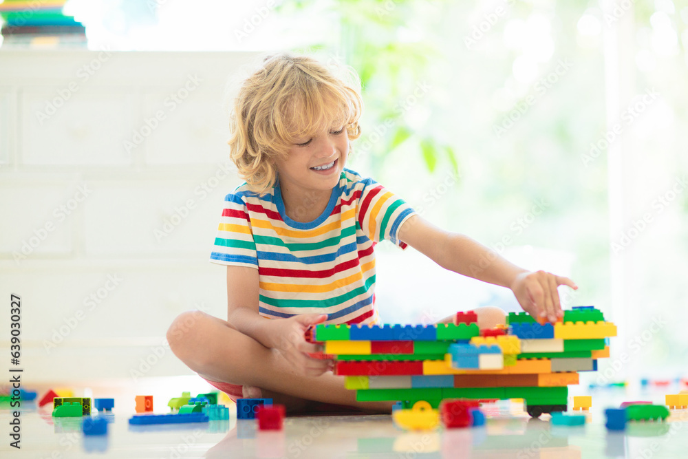 Child playing with toy blocks. Toys for kids. Child playing with toy blocks. Toys for kids.