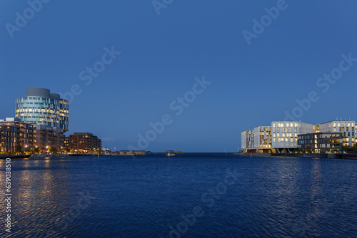 Photography Outdoor night scenery at Nordhavn Bassin with background of famous office building Portland Towers Corporate Offices and UN City
