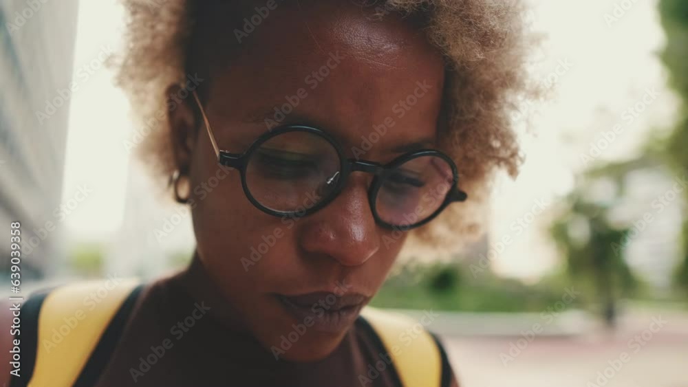Close up portrait of young woman face looking around Close up portrait of young woman face looking around