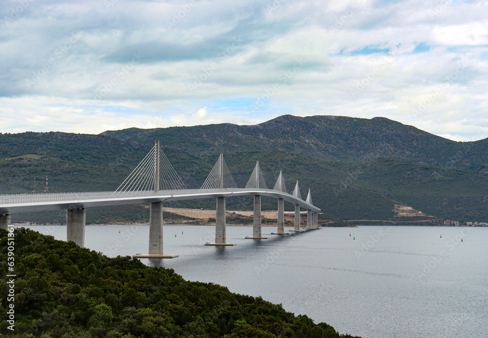 Pelješac bridge in Croatian Dalmatia coast over the adriatic sea on a cloudy day