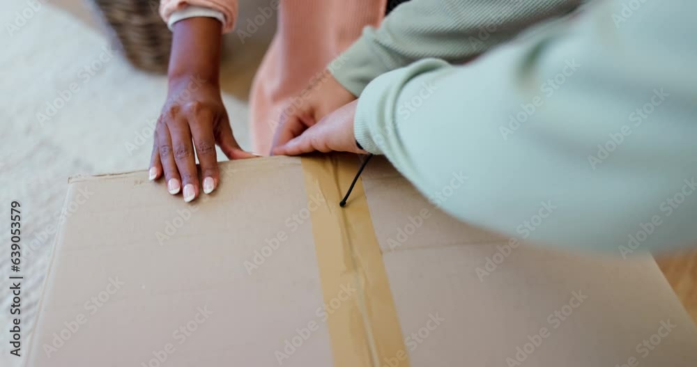 Closeup, hands and closing a box for moving, real estate or help with ...