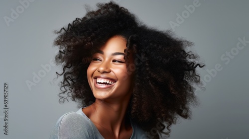 Stock photo of beautiful black woman smiling and having in studio shot