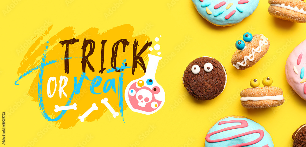 Halloween monster cookies, donuts and text TRICK OR TREAT on yellow background