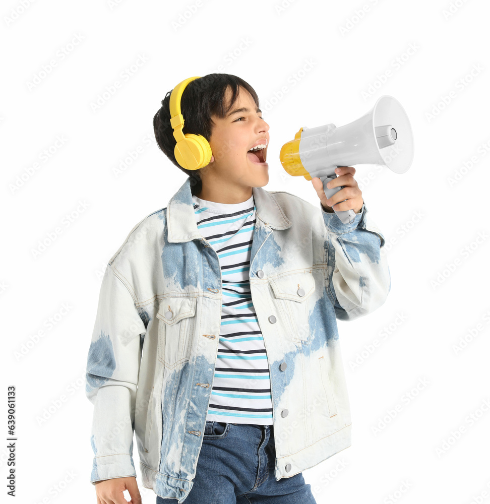 Little boy with headphones shouting into megaphone on white background Little boy with headphones shouting into megaphone on white background