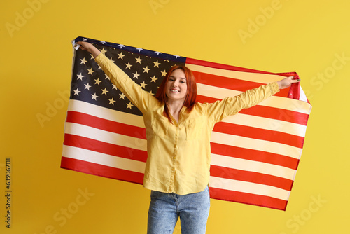Young redhead woman with US...