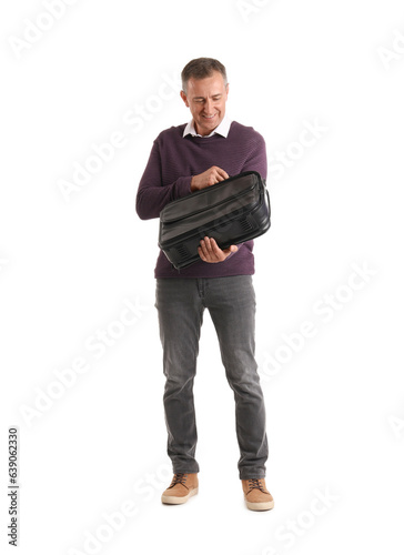 Mature businessman with bri...