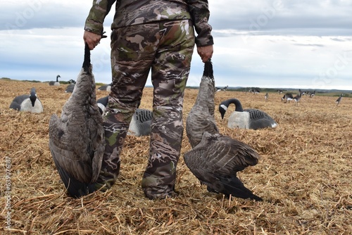 Woman Hunting Water Fowl Ducks Geese in Canada with Camo On