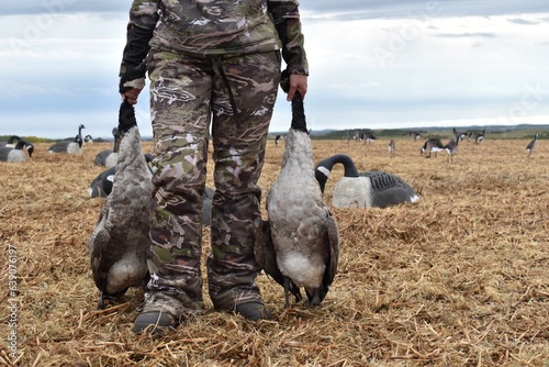 Woman Hunting Water Fowl Ducks Geese in Canada with Camo On