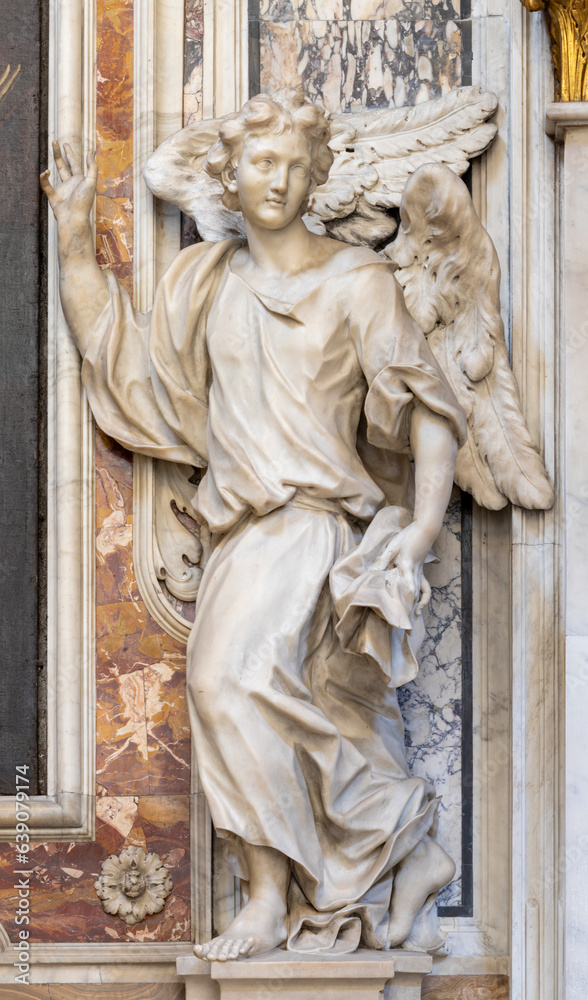 GENOVA, ITALY - MARCH 8, 2023: The marble baroque statue of angel in the church Chiesa di san Filippo Neri by  Daniello Solaro  (1649 – 1726).