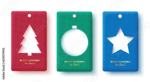 Fototapeta Naklejka Na Ścianę i Meble -  Christmas tags vector set design. Merry christmas and happy new year greeting text with pine tree, ball and xmas star shape cut out elements. Vector illustration seasonal sticker and tag collection.

