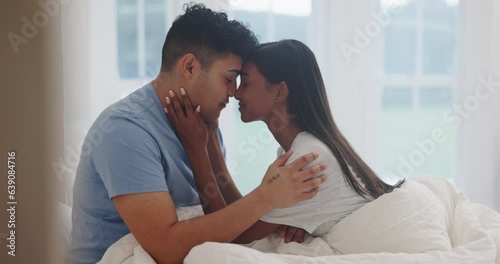 Love, morning and couple in bed for intimacy, care and affection at home for healthy relationship. Romance, marriage and man and woman in bedroom with faces together for bonding, trust and embrace