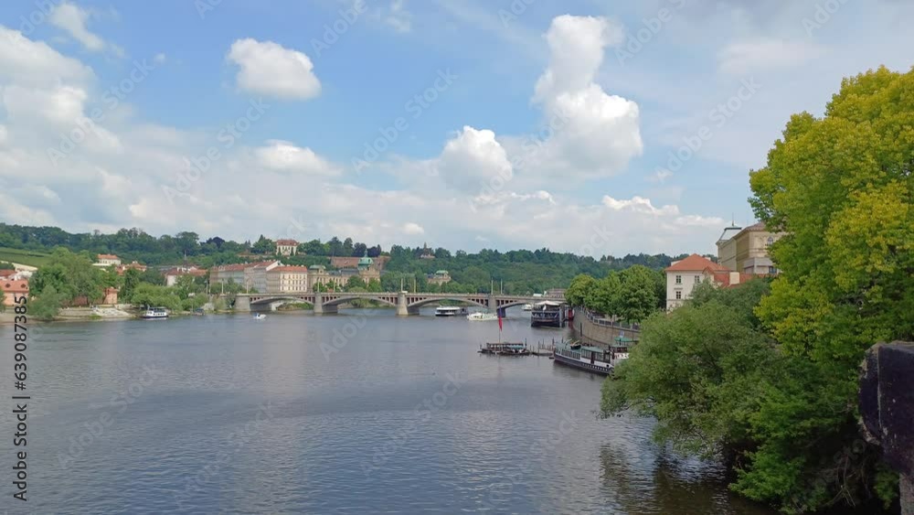 Ships and Boats on the Vltava river with Manes bridge in background, Prague city, Czech Republic.. Ships and Boats on the Vltava river with Manes bridge in background, Prague city, Czech Republic..