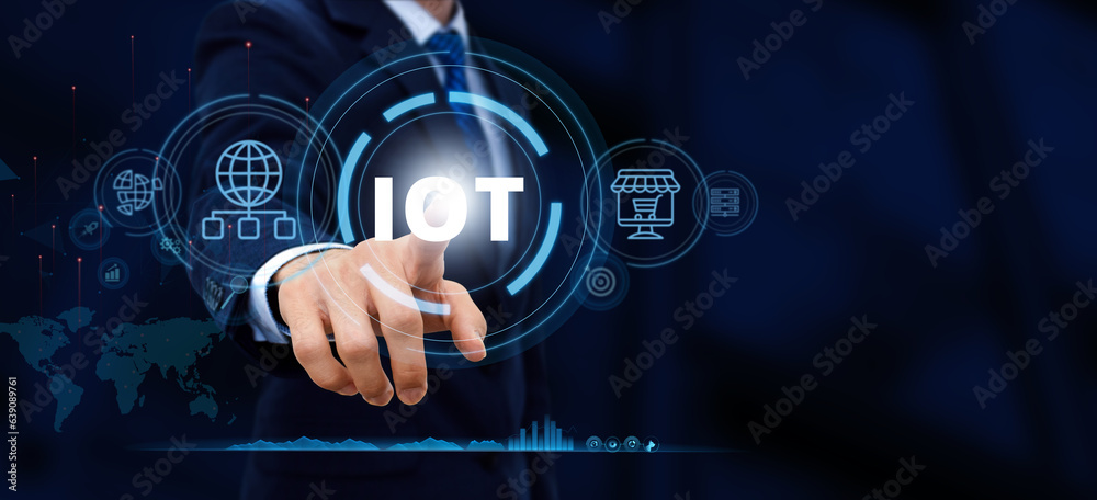 Internet of things - IOT concept. Businessman touch IOT products and solutions. Internet of things - IOT concept. Businessman touch IOT products and solutions.