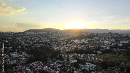 Wallpaper Mural Captivating Aerial View of Naucalpan Cityscape from Drone during sunset.  The drone reveals the intricate tapestry of urban life and natural beauty. Torontodigital.ca