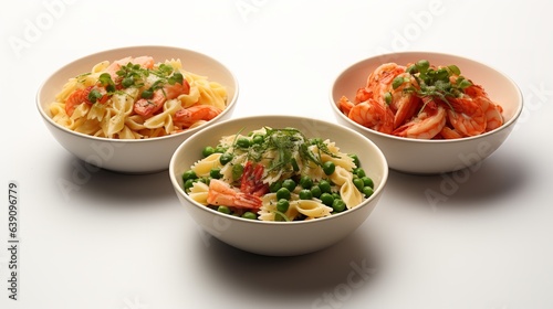 Bowl of Farfalle pasta with seafood, cherry tomatoes and green peas isolated on a white background