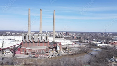 Closed coal power plant in Michigan, aerial drone orbit view photo