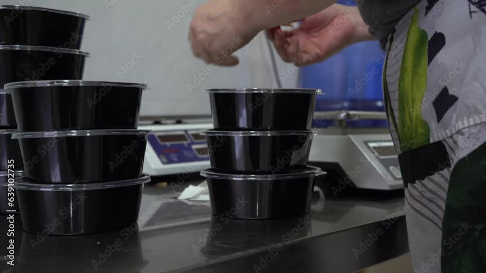 packing foods in a disposable container in a Korean restaurant packing foods in a disposable container in a Korean restaurant