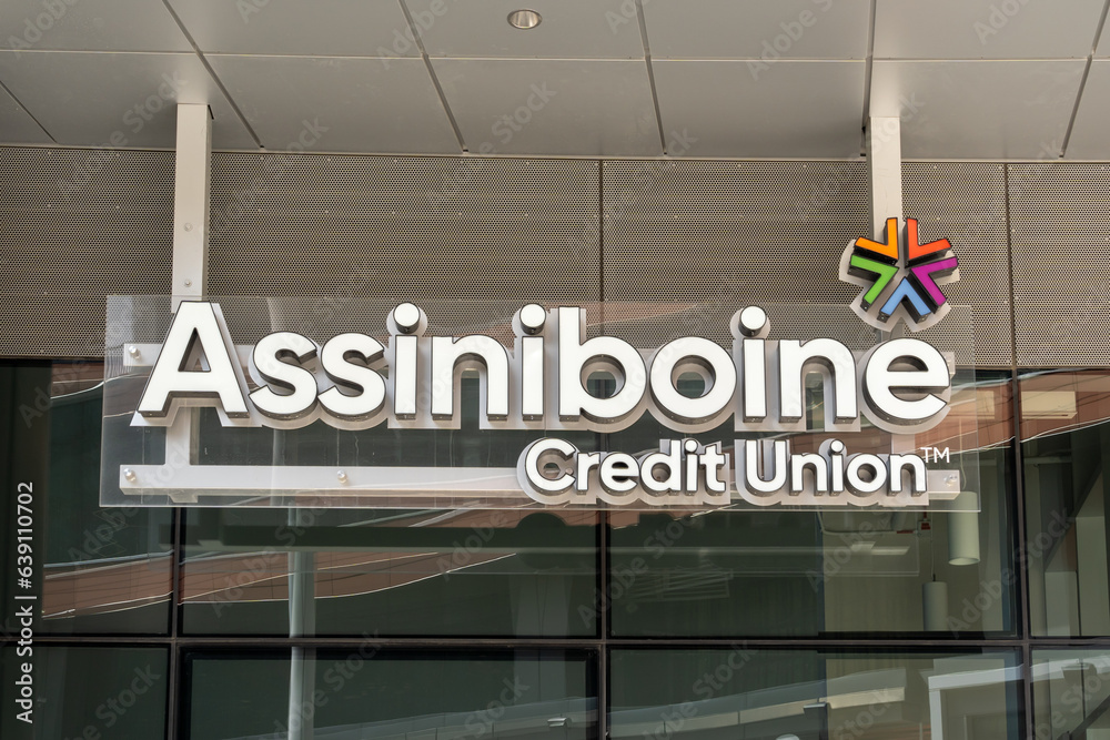 Close up of Assiniboine Credit Union logo and sign on the building at