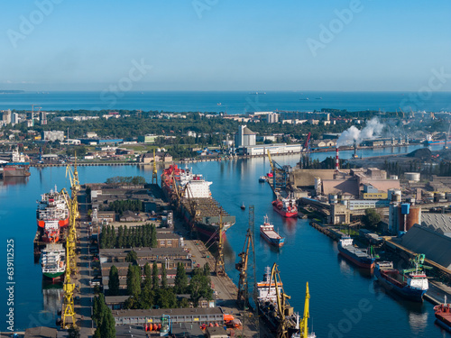 Cranes in Gdansk Shipyard Aerial View. Motlawa River Industrial Part of the City Gdansk, Pomerania, Poland. Europe. © Curioso.Photography