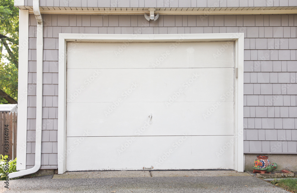 garage embodies individualism, mobility, and suburban life. It symbolizes personal space, car culture, storage, and the pursuit of the American Dream garage embodies individualism, mobility, and suburban life. It symbolizes personal space, car culture, storage, and the pursuit of the American Dream