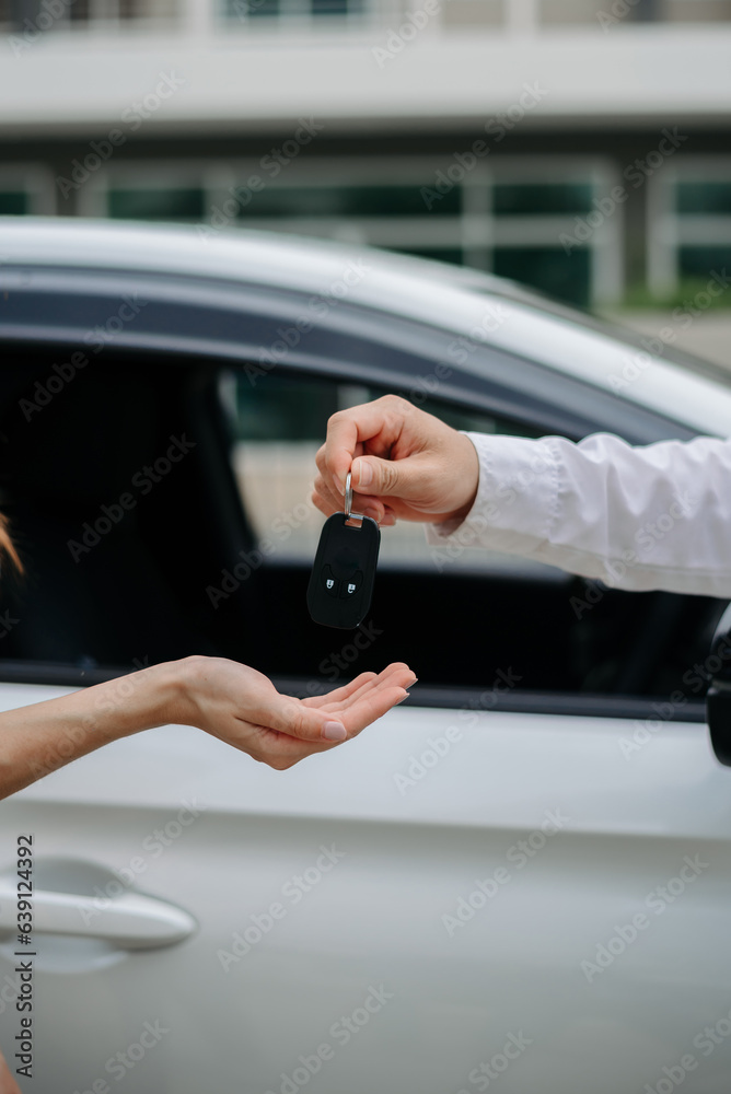 Obraz premium Automotive business, car sale or rental concept Customer with car dealer agent making deal and signing on agreement document contract in auto showroom or on road