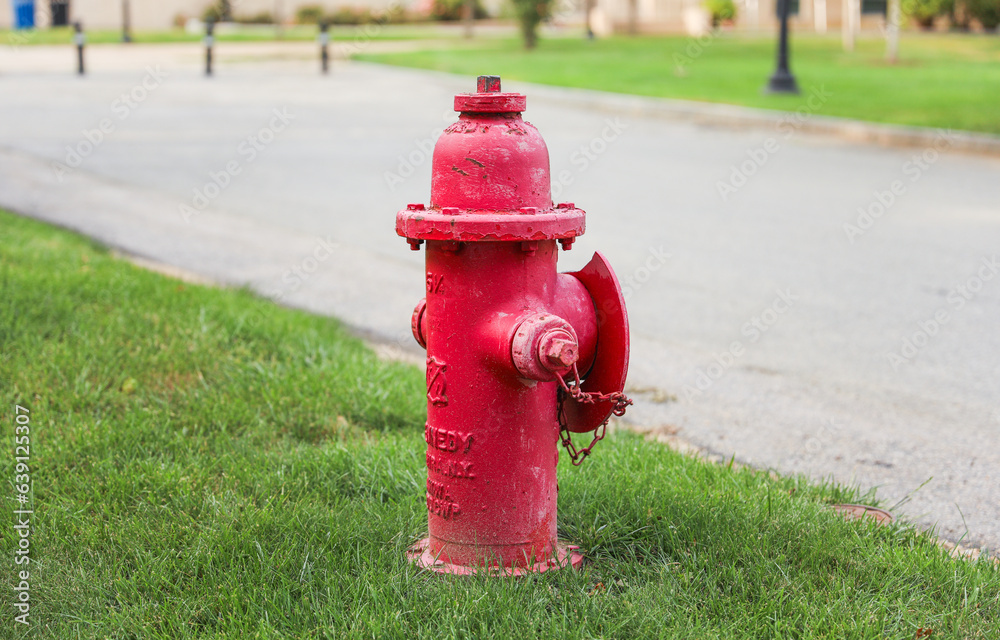 Fire hydrant stands ready, a symbol of safety, preparedness, and vital connection to quenching emergencies on city streets Fire hydrant stands ready, a symbol of safety, preparedness, and vital connection to quenching emergencies on city streets