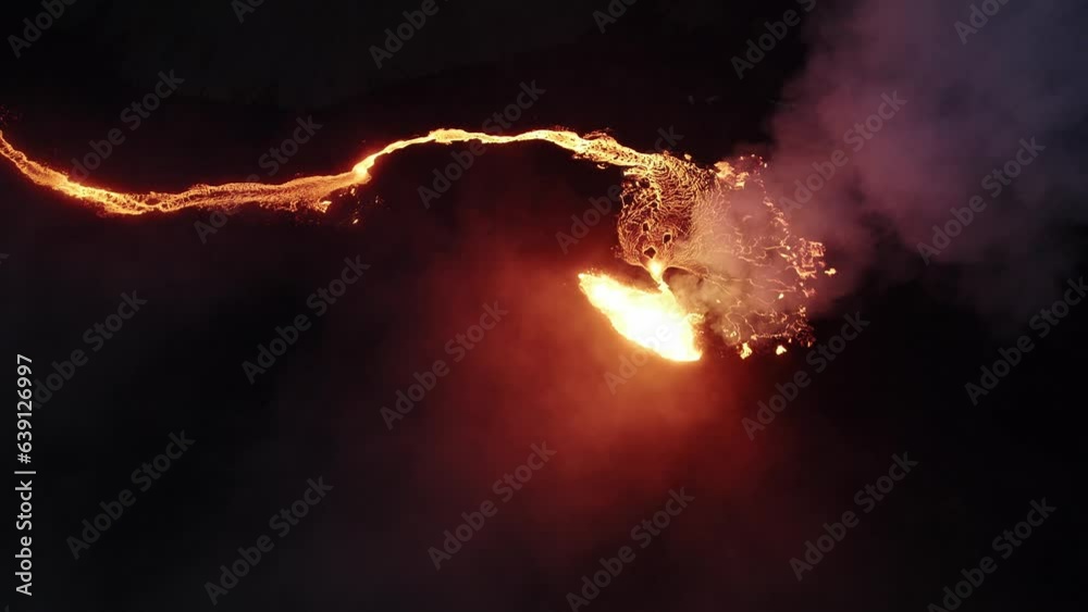 drone shot of the litli hrutur volcano in iceland with fog and smoke 16