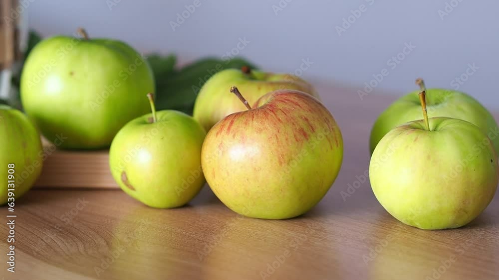 Natural organic, orchard green apples on the table. Ingredients for home baking. Autumn mood to cook homemade, hot food. Natural organic, orchard green apples on the table. Ingredients for home baking. Autumn mood to cook homemade, hot food.