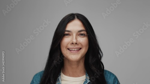 Portraits of people looking at camera on grey background close up. Modern concept of mixed races or multiethnic diversity of older men and youth women together. Ethnicity of afro boy and small girl