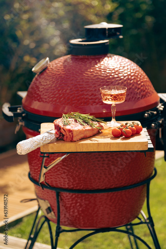 Barbecue Tomahawk Steak ready to be grilled outdoors