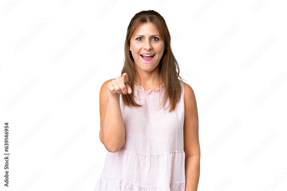 Middle age woman over isolated background surprised and pointing front Middle age woman over isolated background surprised and pointing front