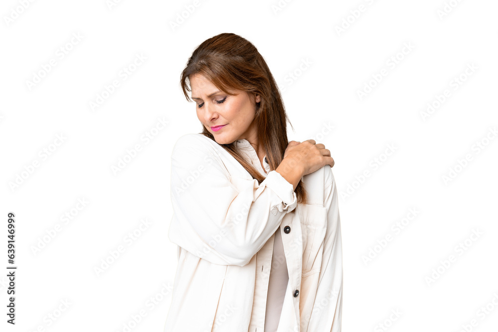 Middle age woman over isolated background suffering from pain in shoulder for having made an effort Middle age woman over isolated background suffering from pain in shoulder for having made an effort