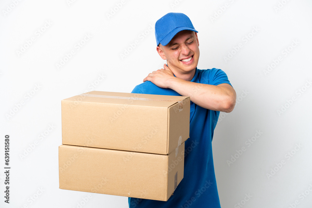 Young delivery Brazilian man isolated ops white background suffering from pain in shoulder for having made an effort Young delivery Brazilian man isolated ops white background suffering from pain in shoulder for having made an effort