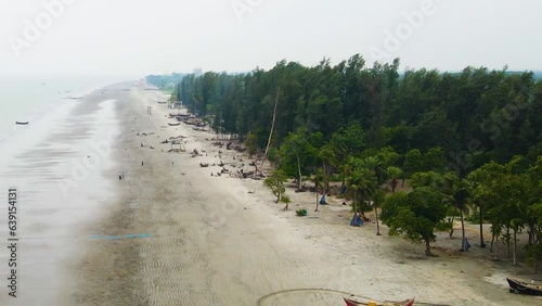 Aerial Revealed Traditional Fishing Boat At The Seashore Of Kuakata Sea Beach In Bangladesh. Drone Shot photo