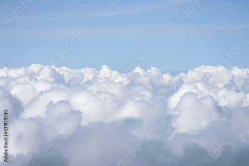 Fototapeta Naklejka Na Ścianę i Meble -  Mountain landscape with clouds and blue sky at Mount Kawa Ijen, Indonesia.