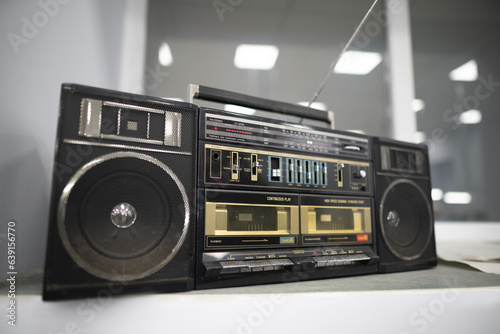 an old cassette recorder, a music center with a radio receiver