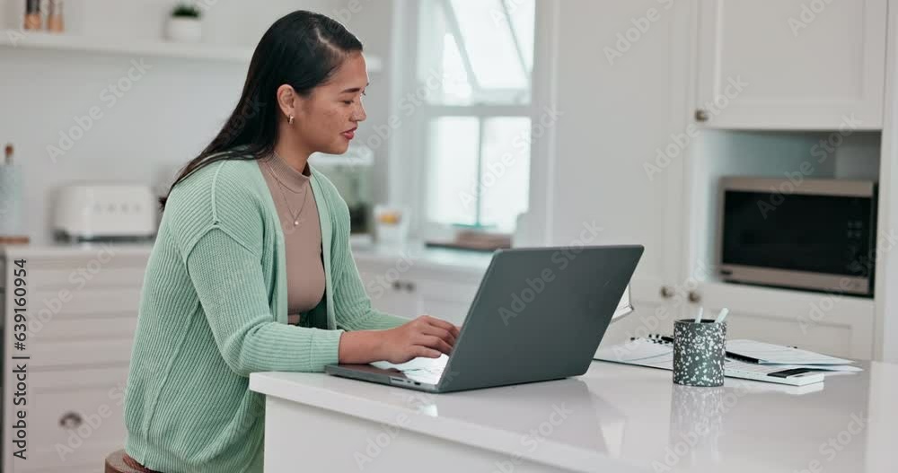 Happy asian woman, laptop and typing in remote work, finance or budget planning in kitchen at home. Female person or freelancer smile on computer with documents, paperwork or financial plan in house Happy asian woman, laptop and typing in remote work, finance or budget planning in kitchen at home. Female person or freelancer smile on computer with documents, paperwork or financial plan in house