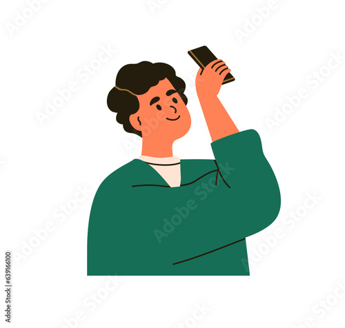 Girl holding mobile phone, taking photo, photograph. Happy excited young woma...