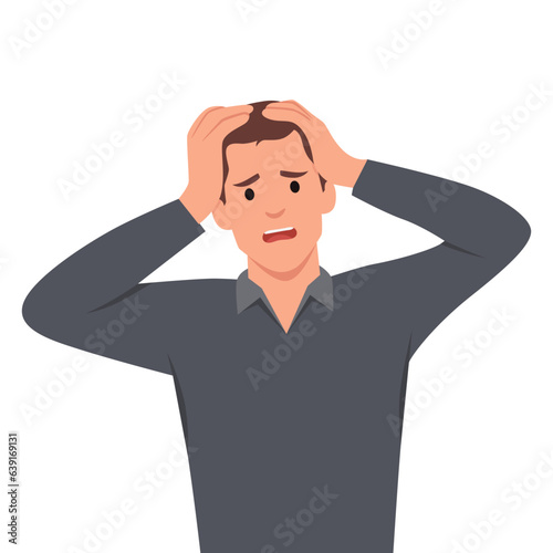 Shocked/amazed young business man holding hands on head and keeping mouth open. Headache pain or stress. Human emotions, facial expressions