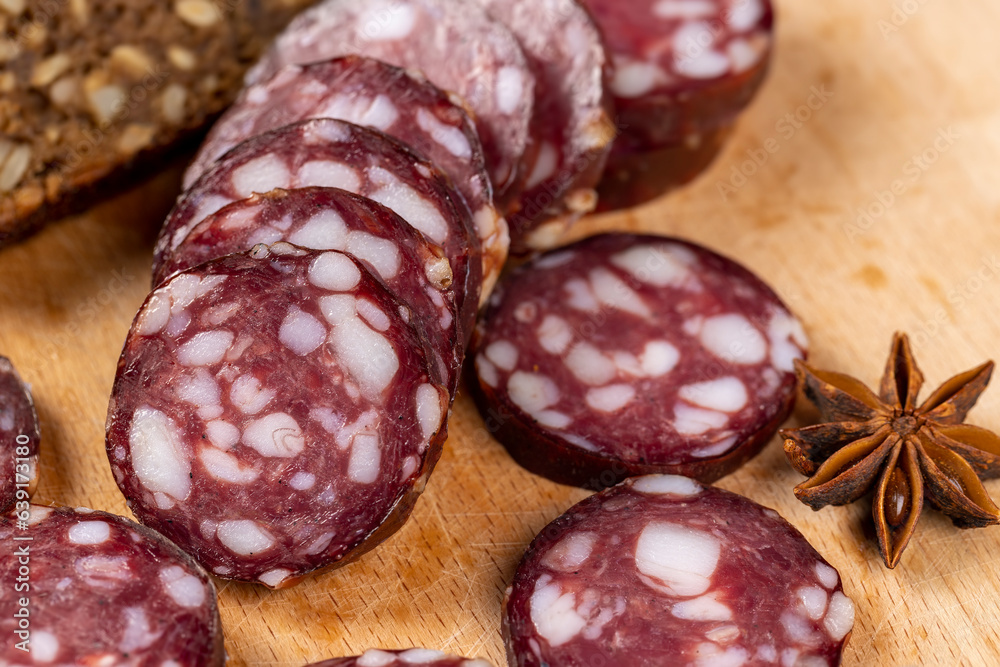 sliced high-quality pork sausage with the addition of lard pieces sliced high-quality pork sausage with the addition of lard pieces