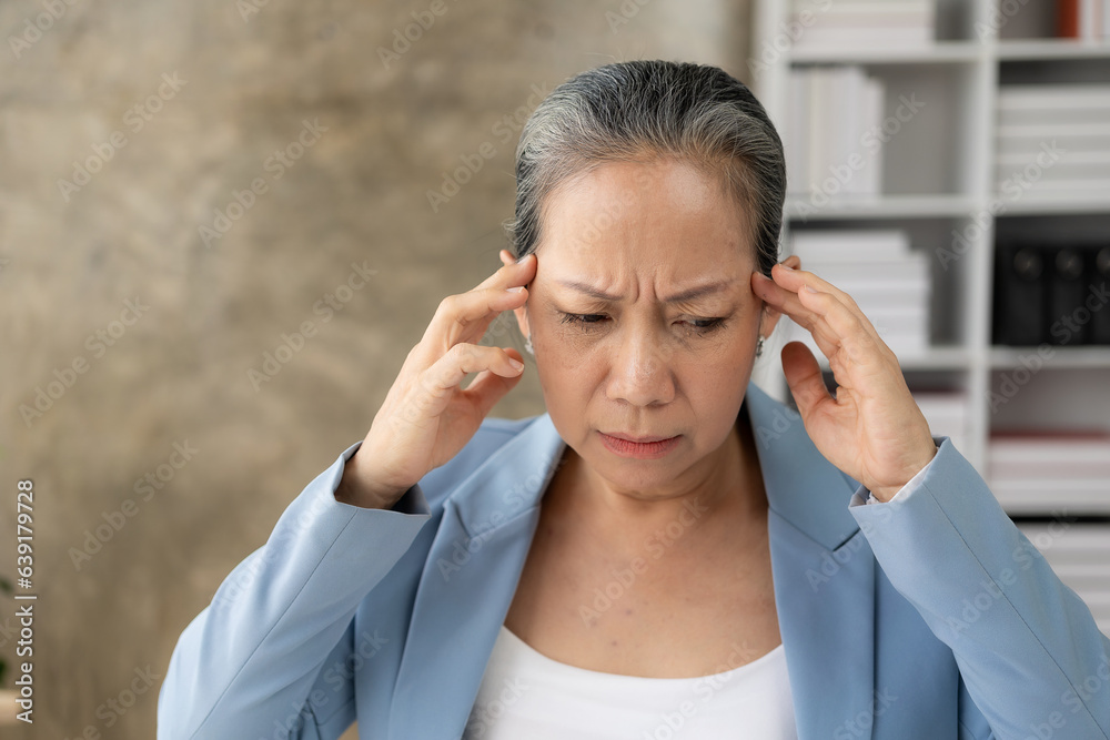 Senior asian doctor, psychiatrist, female doctor consulting young patient, using stethoscope to listen, clinic appointment, hospital. Senior asian doctor, psychiatrist, female doctor consulting young patient, using stethoscope to listen, clinic appointment, hospital.