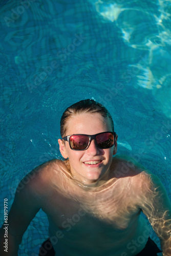 Portrait of a boy in a swimming pool
