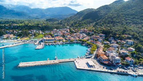 Aerial view of the port of the coastal village of Vasiliki in the south of the island of Lefkada, Greece. Beautiful crystal clear turquoise and blue waters photo