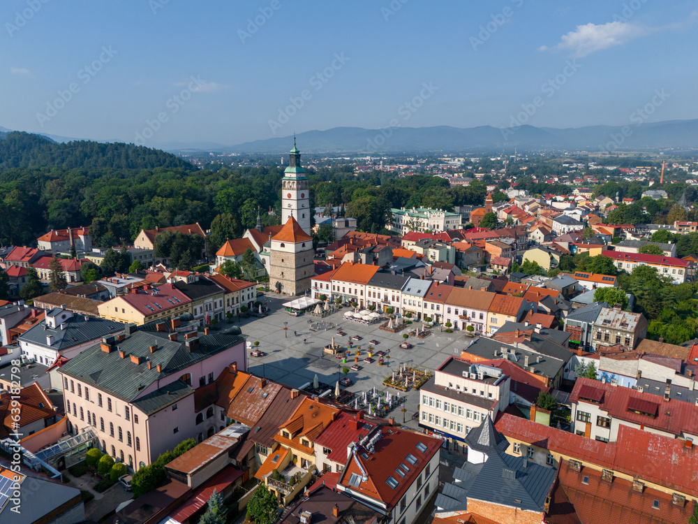 Obraz premium Aerial view of Zywiec. The old town of Zywiec, traditional architecture and the surrounding mountains of the Silesian Beskids and the Zywiec Beskids. Silesian Voivodeship. Poland.